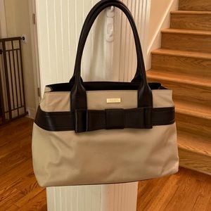 Kate Spade Purse. Tan with black bow.